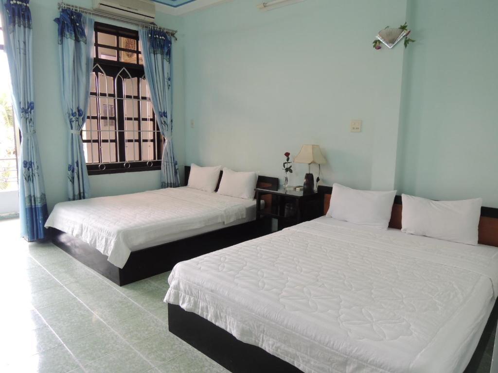 Hotel Four Seasons House Nha Trang Habitación foto